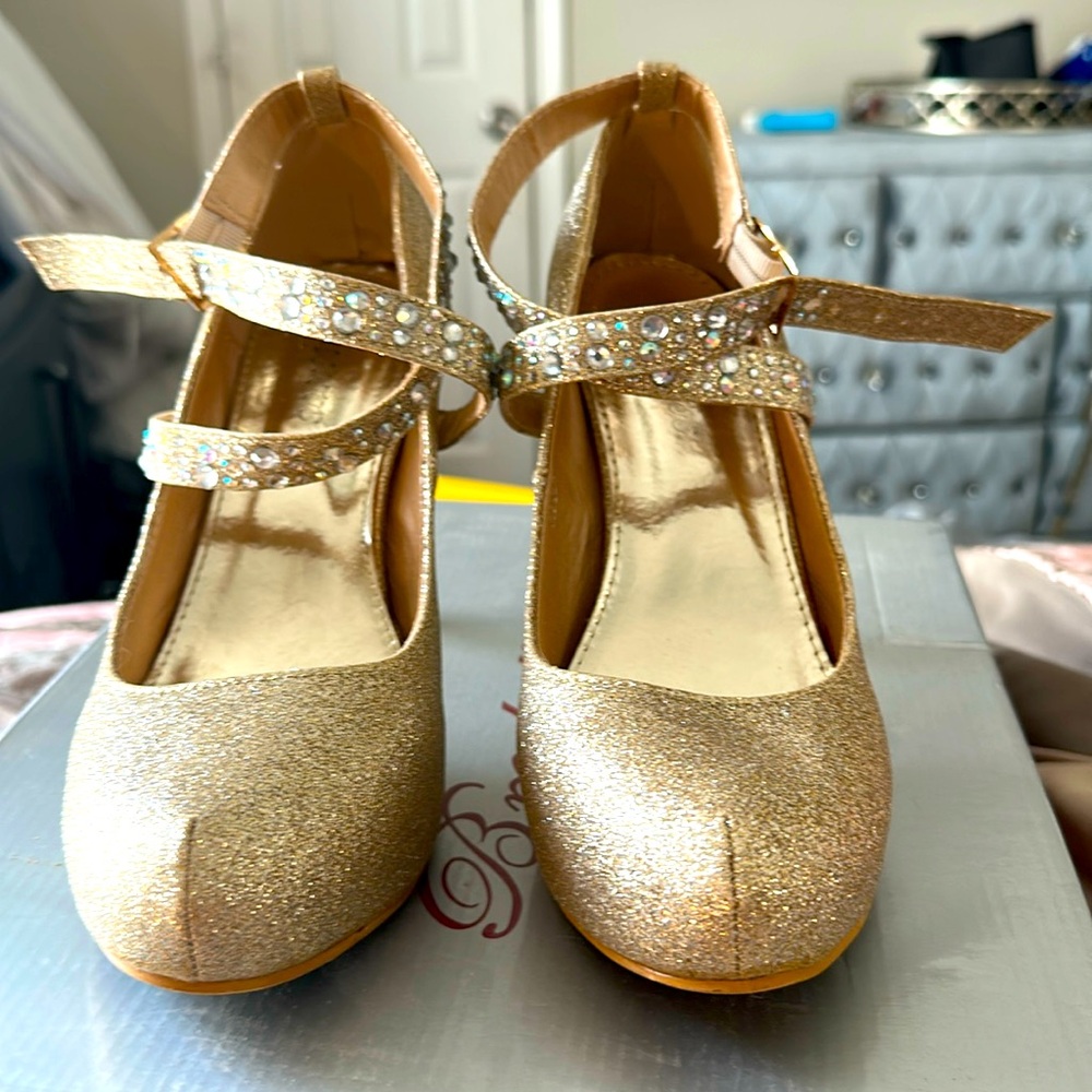 Glitter and studded formal wear high heels.
